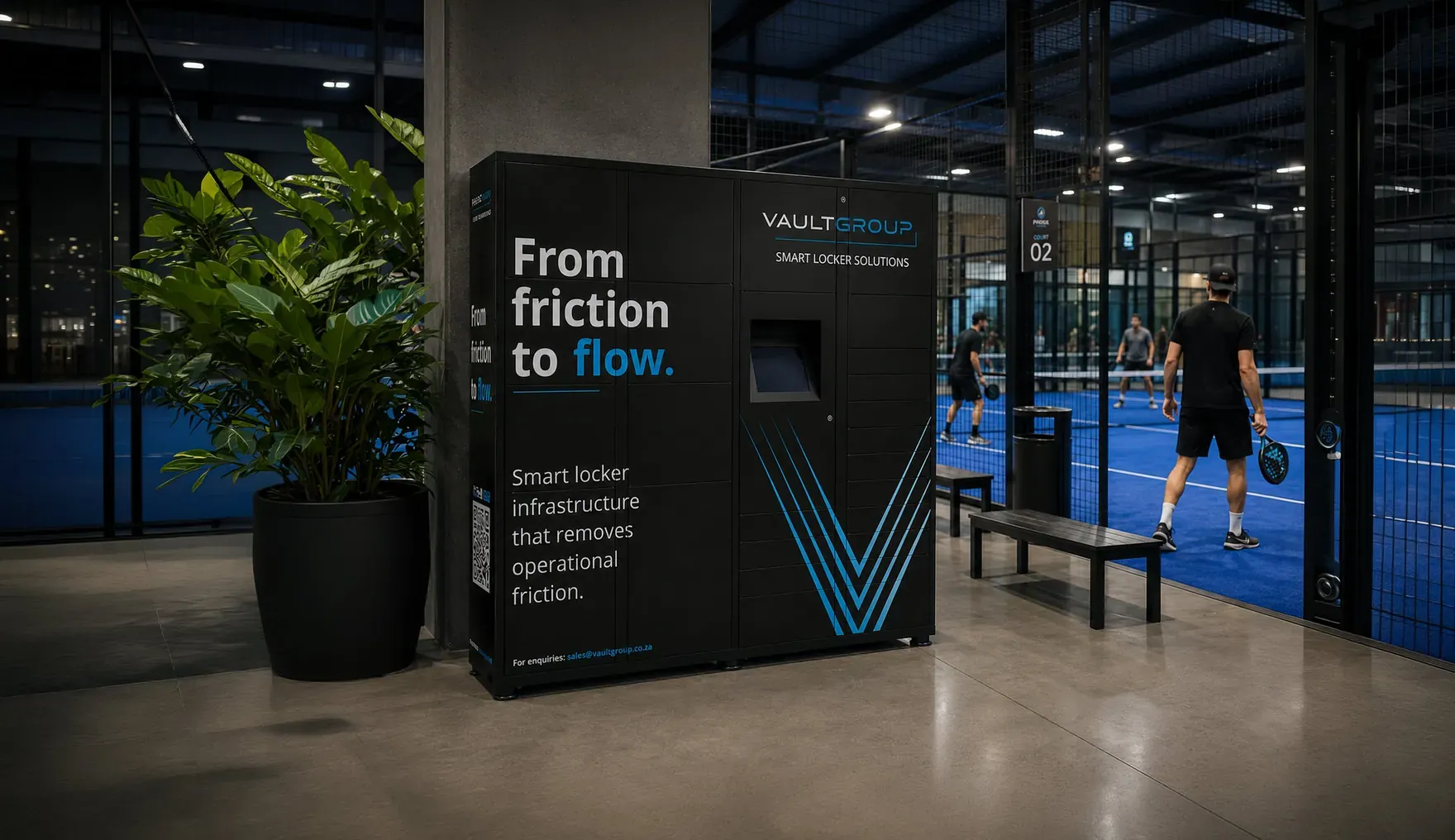 A VaultGroup PackVault smart locker beside an indoor padel court